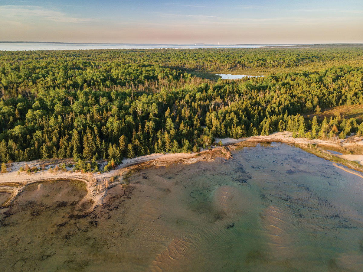 Miles of glorious Lake Michigan terrain lure campers, hikers, beachcombers, and wildlife enthusiasts to Wilderness State Park.